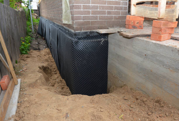 Happy homeowners after waterproofing job in Loveland
